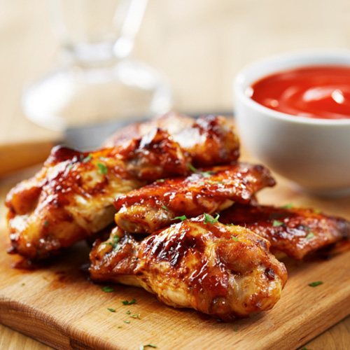 Chicken wings with sriracha sauce